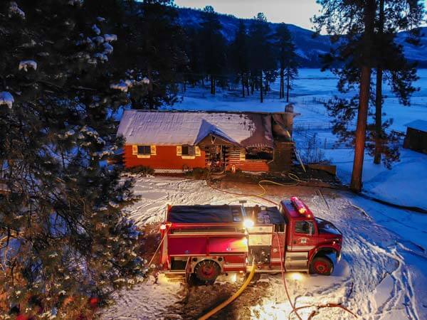 Fire trucks outside in winter